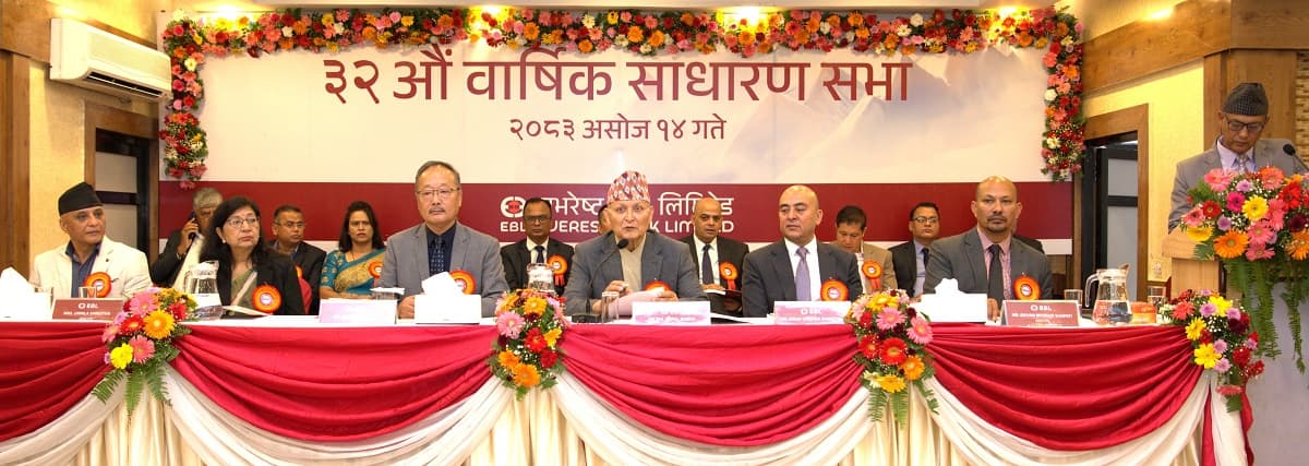 Board members and executives of Everest Bank seated at the head table during the 32nd annual general meeting.
