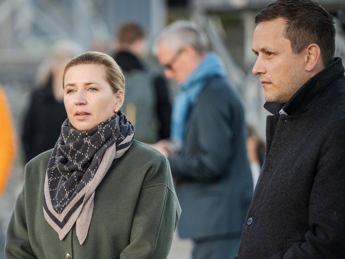 Danish Prime Minister Mette Frederiksen standing alongside Greenland Premier Múte Egede.