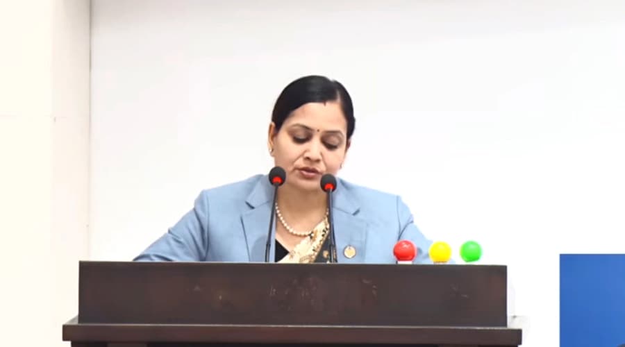Health Minister Nisha Mehta speaking at the parliamentary rostrum.