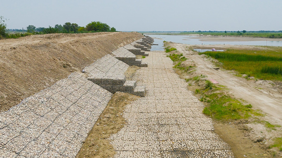 Stone gabion spurs and embankment constructed along the banks of the Rapti River.