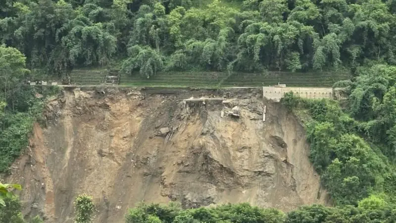 A massive slope landslide washing away a section of highway at Krishnabhir.