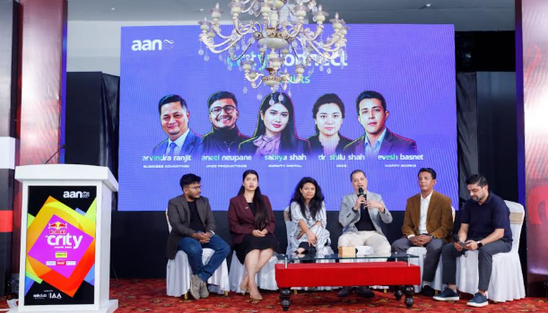 Panelists participate in an open discussion on stage during the Kriti Connect session.